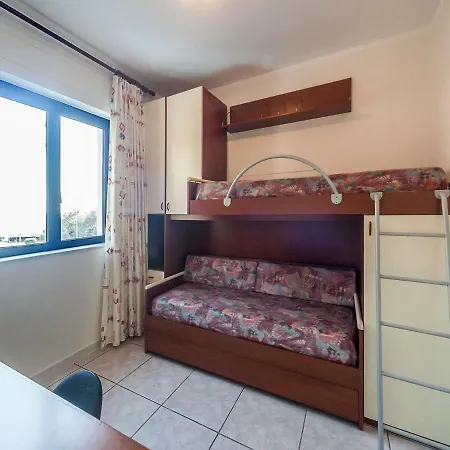 Locazione Turistica Baia Blu Side Apartment